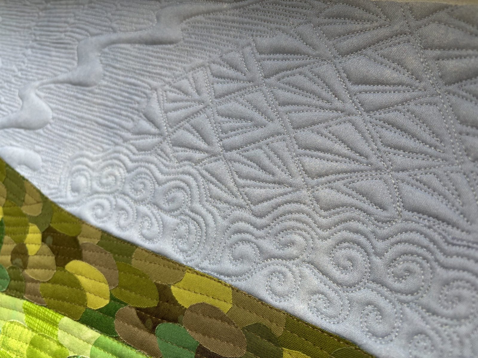 Quilted textile representing creative coaching