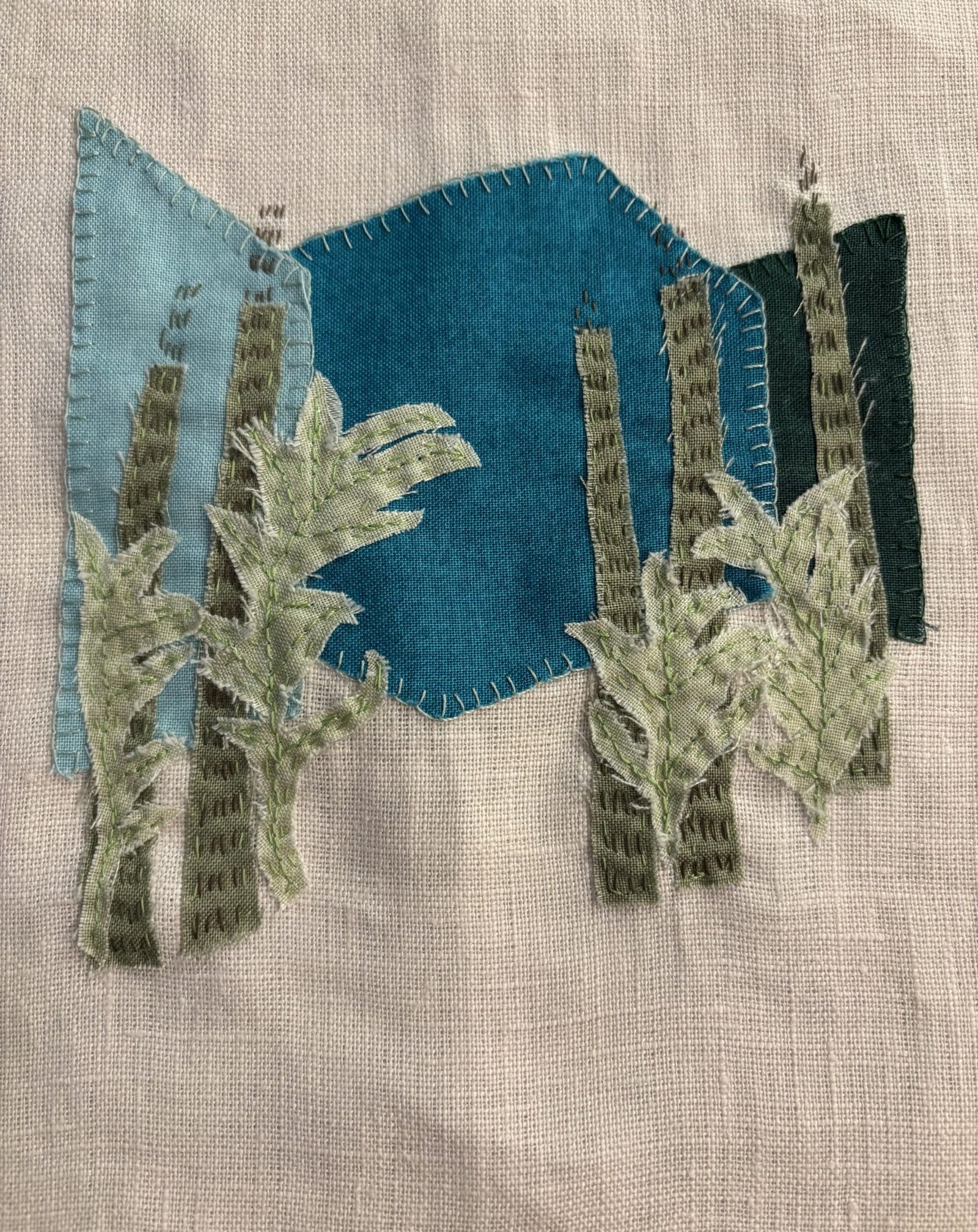 Hand-stitched textile journal detail